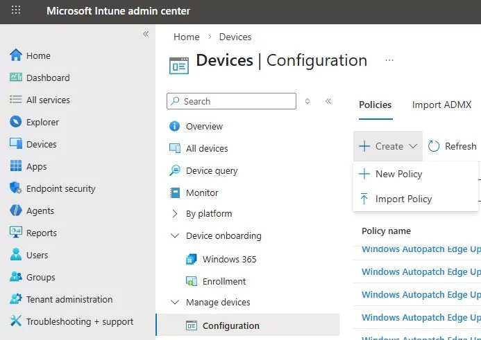 Intune Devices Configuration page with Create menu open showing New Policy option