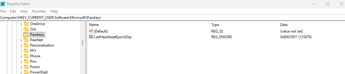 Registry Editor showing HKEY_CURRENT_USER Software Microsoft Passkeys key with LastHeartbeatEpochDay REG_DWORD value
